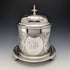 Antique British silver plated biscuit barrel with bird decoration
