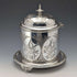 Antique British silver plated biscuit barrel with bird decoration