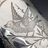 Antique British silver plated biscuit barrel with bird decoration
