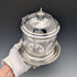 Antique British silver plated biscuit barrel with bird decoration
