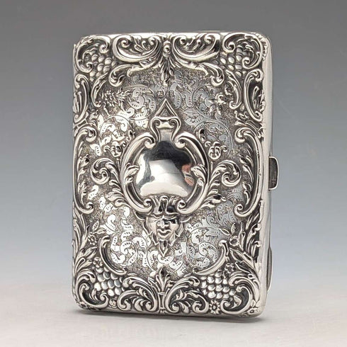 Tarjetero de plata de ley victoriano, 1898, con decoración en relieve, de Joseph Gloster, extra grueso, apertura doble, 127g, en excelente estado.