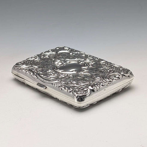Tarjetero de plata de ley victoriano, 1898, con decoración en relieve, de Joseph Gloster, extra grueso, apertura doble, 127g, en excelente estado.