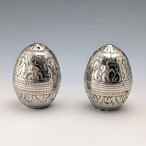 Pareja de saleros y pimenteros vintage con forma de huevo en plata chapada