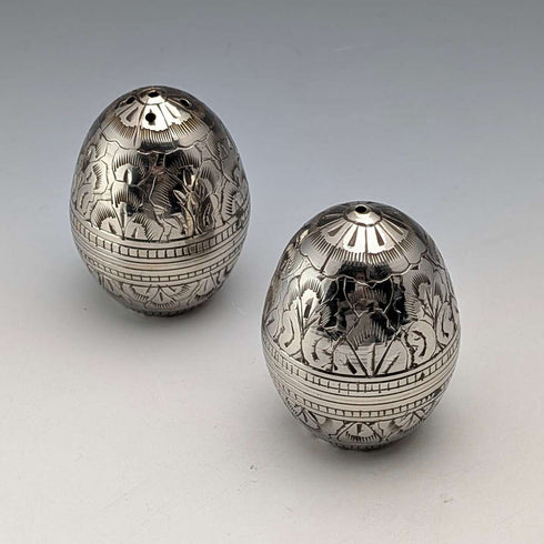Pareja de saleros y pimenteros vintage con forma de huevo en plata chapada