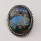 Vintage British sterling silver oval brooch featuring two women with butterfly wings