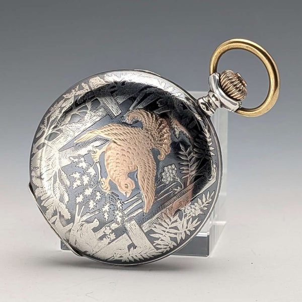 Reloj de bolsillo antiguo húngaro Brauswetter Janos, caja tipo saboneta de plata con decoración de nielo, en buen estado de funcionamiento