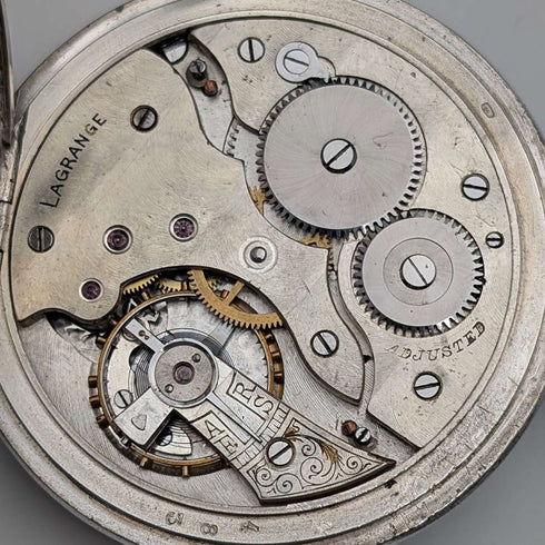 Reloj de bolsillo antiguo Lagrange, circa 1900, caja de plata 800, esfera abierta, en buen estado de funcionamiento.