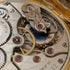 Reloj de bolsillo Zenith de alrededor de 1913, relieve de dragón, caja saboneta de oro de 18 quilates, en buen estado de funcionamiento.