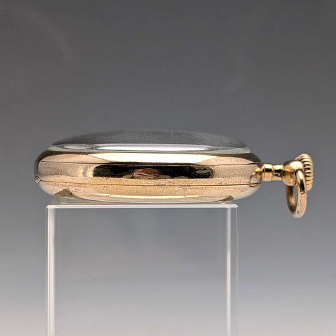 Reloj de bolsillo Omega vintage de alrededor de 1935, caja Denison de frente abierto chapada en oro, en buen estado de funcionamiento