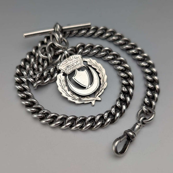 Cadena Albert de plata esterlina antigua inglesa de circa 1922, 60g, con medalla fob de plata esterlina