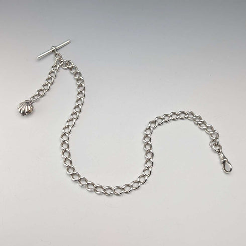 Cadena Albert de plata esterlina antigua inglesa de circa 1897, 46 g, con charm fob de nácar