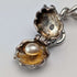 Cadena Albert de plata esterlina antigua inglesa de circa 1897, 46 g, con charm fob de nácar