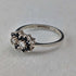 Anillo vintage británico de plata de ley con doble racimo azul y transparente (talla 11)