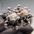 Anillo vintage británico de plata de ley con doble racimo azul y transparente (talla 11)