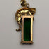 Colgante vintage de pantera en plata de ley dorada con piedra verde
