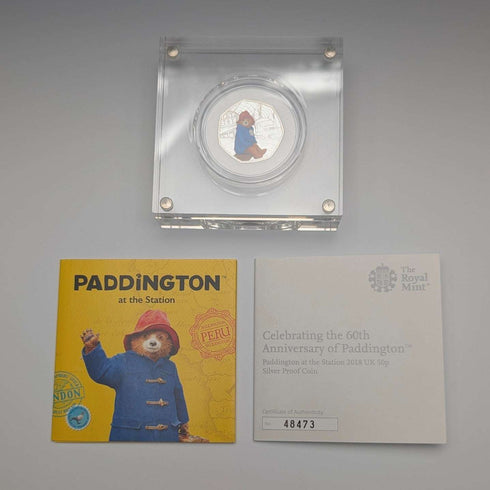 Moneda conmemorativa de plata de 50 peniques del 60.º aniversario de "Paddington Bear" del Reino Unido, con estuche y certificado de la Royal Mint