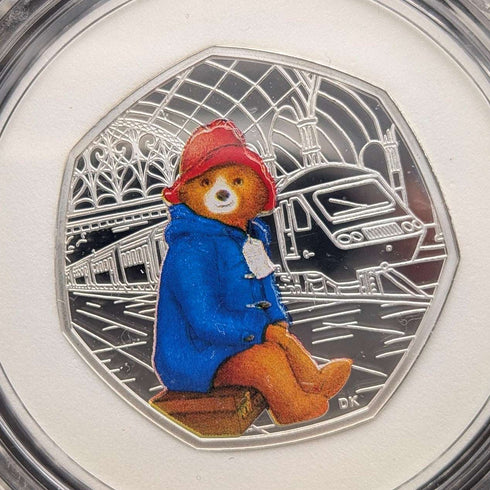 Moneda conmemorativa de plata de 50 peniques del 60.º aniversario de "Paddington Bear" del Reino Unido, con estuche y certificado de la Royal Mint