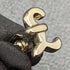 Gemelos de plata de ley (sterling silver) fabricados en el Reino Unido con baño de oro y diseño de libra esterlina