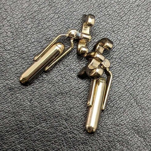 Gemelos de plata de ley (sterling silver) fabricados en el Reino Unido con baño de oro y diseño de libra esterlina