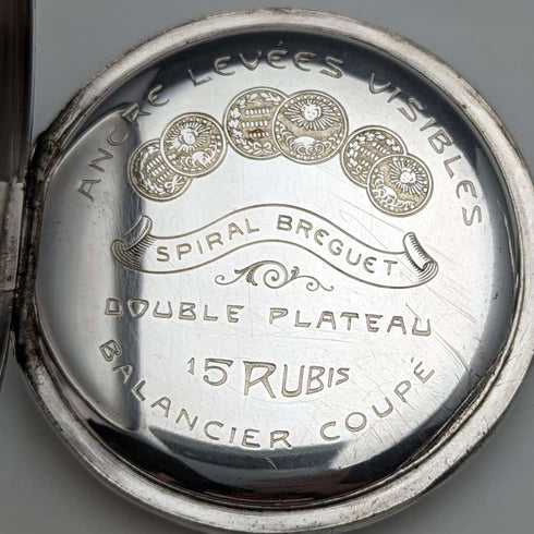 Reloj de bolsillo suizo antiguo, caja de plata grabada, esfera abierta, esfera de papel, en funcionamiento.