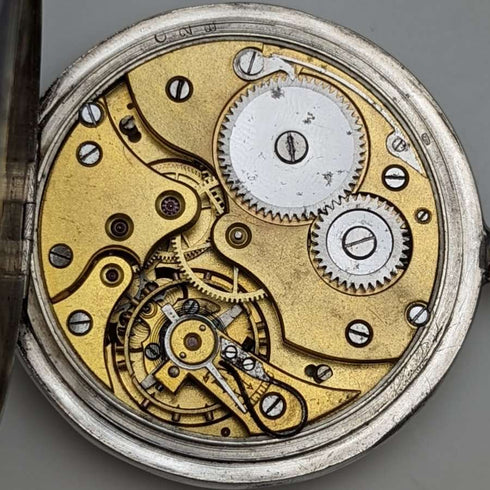 Reloj de bolsillo suizo antiguo, caja de plata grabada, esfera abierta, esfera de papel, en funcionamiento.