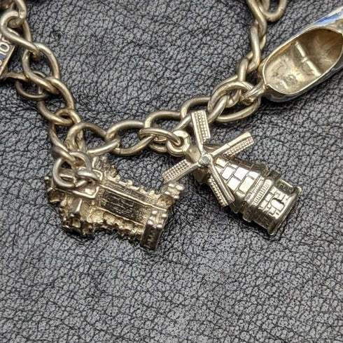 British vintage sterling silver charm bracelet 21g