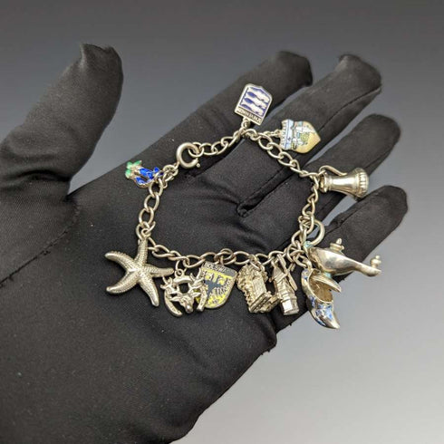 British vintage sterling silver charm bracelet 21g