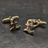 Gemelos de plata de ley (sterling silver) fabricados en el Reino Unido con baño de oro y diseño de libra esterlina