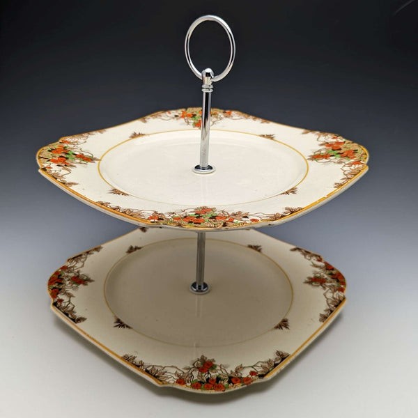 Soporte para pasteles de dos niveles con platos de cerámica vintage británica