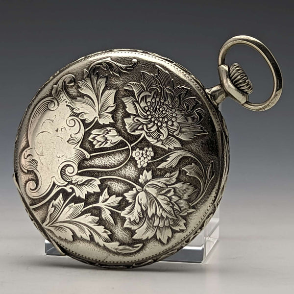 Reloj de bolsillo antiguo sin marca, grabado floral Art Nouveau, caja de aleación, en buen estado de funcionamiento