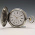 Reloj de bolsillo Longines antiguo, circa 1907, caja de plata tipo saboneta con grabados florales, en buen estado de funcionamiento.