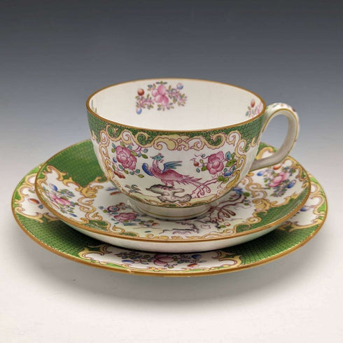 First half of the 20th century British Minton Teacup Trio Cockatrice Green with translation