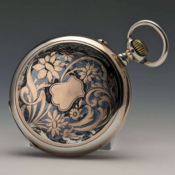 Reloj de bolsillo Longines antiguo de hacia 1911, caja de plata con decoración nielada, en buen estado de funcionamiento